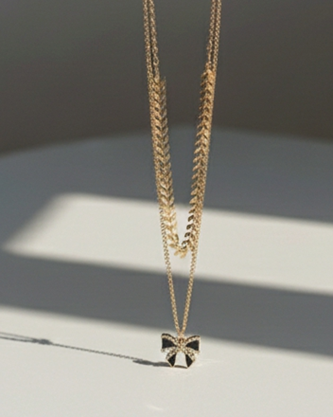 Double Chain Necklace With Bow Pendant. - Image 4